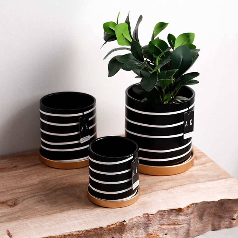 'Straight Around' ceramic flower pot with saucer